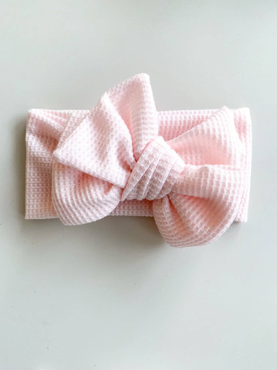 CHUNKY WAFFLE BOW HEADBAND - BABY PINK